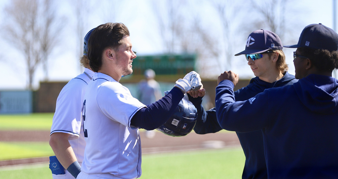 Harrison Bowman celebrates at homerun 