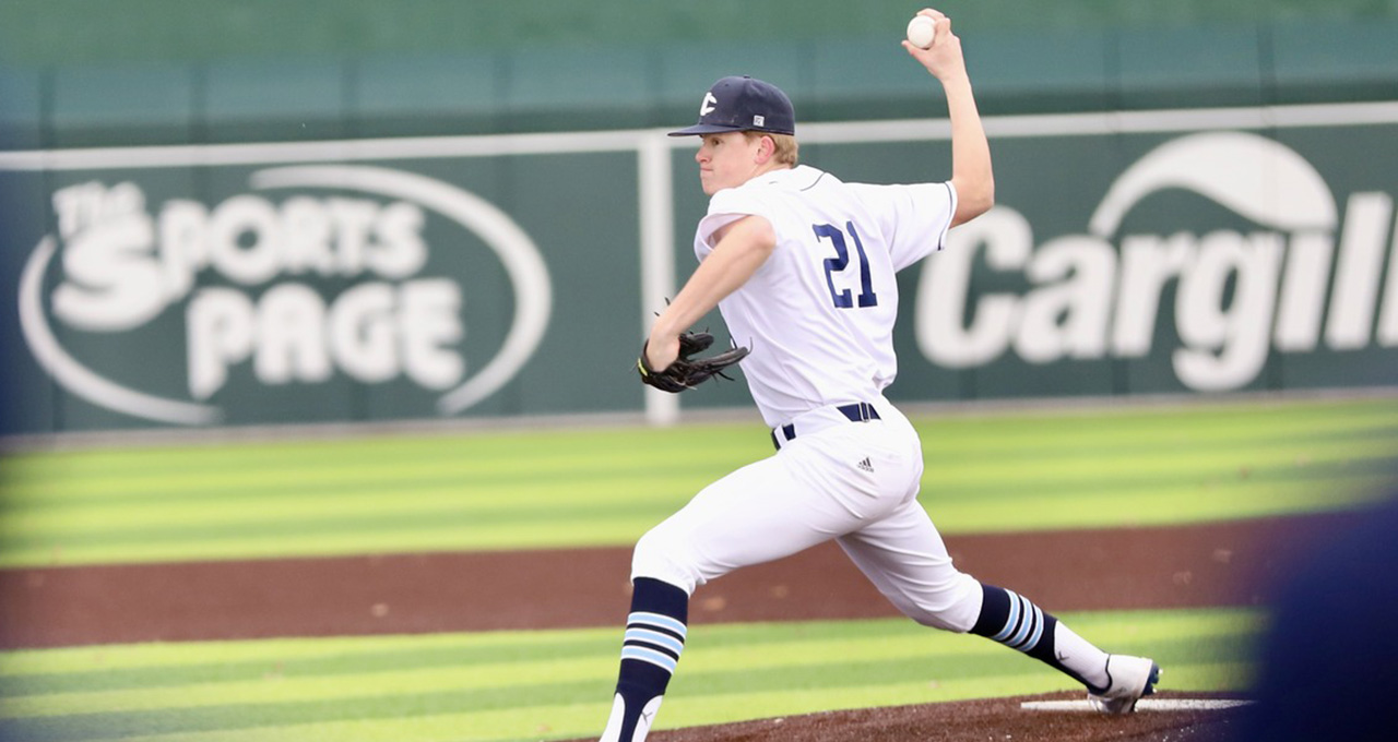 Ryan Ohm pitches for the Tritons vs. John Wood. 