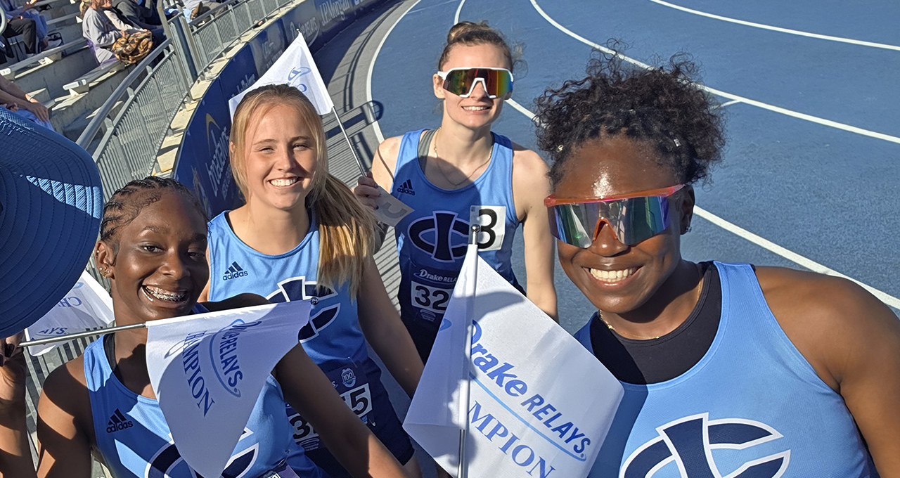 Four Female Athletes Celebrating Championship
